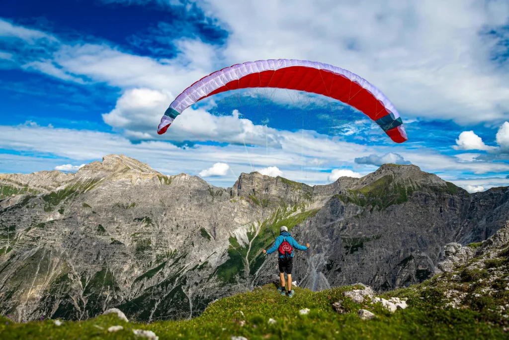 A pilot with the Bantam 2 from Nova on a hike and fly adventure in the Swiss Alps. Ready for take-off